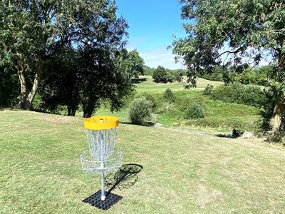 Disc Golf target overlooking valley view and golf course at Hinksey Heights